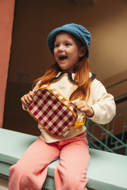 Bold checkered red plum belt bag – the perfect hip pack for travel, airport days, or weekend adventures. Hands-free style with everyday function Hayya